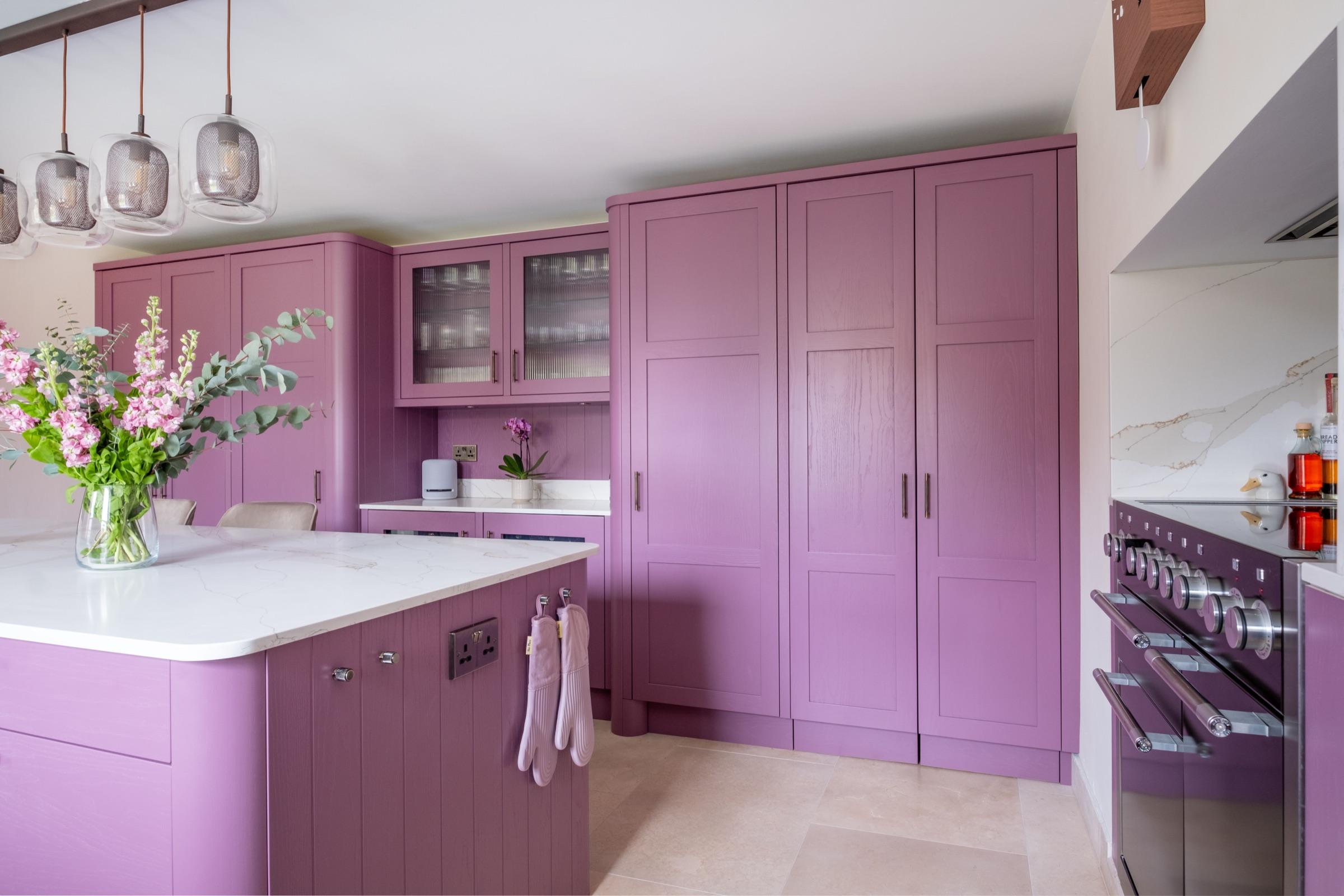 Bold magenta Callerton shaker kitchen