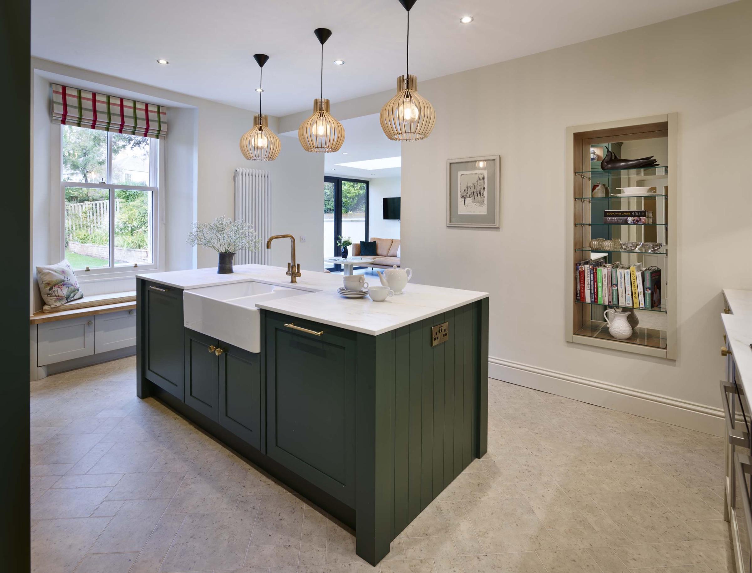 Dark green Callerton shaker kitchen island