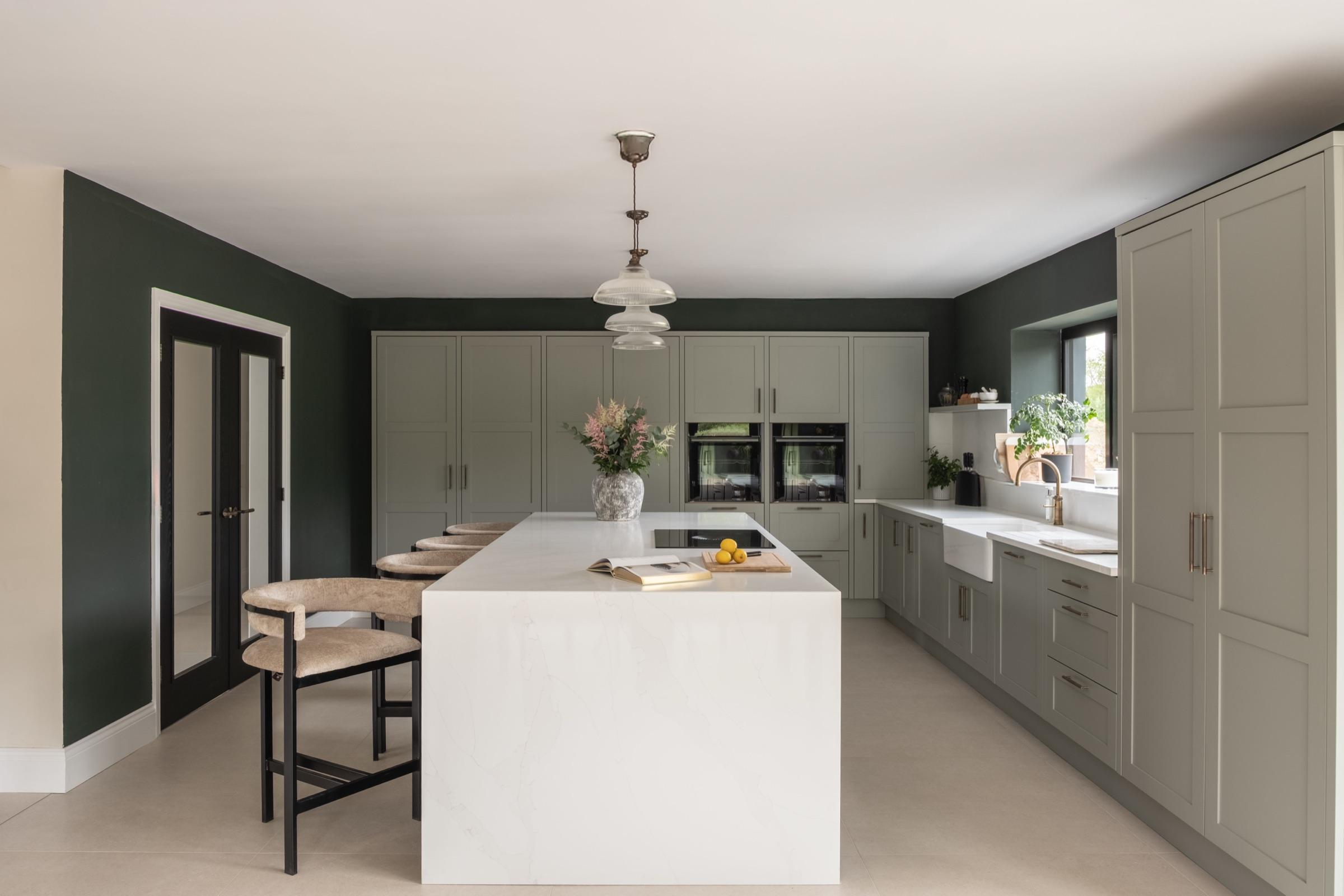 Sage green Callerton shaker kitchen